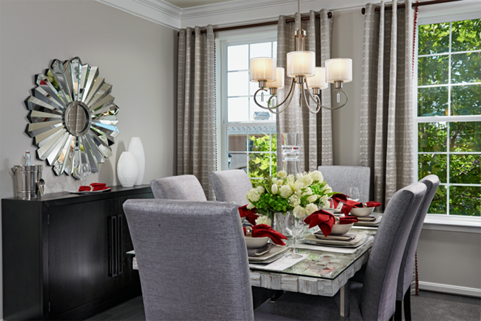 Formal dining room with Progress Lighting’s Invite chandelier 