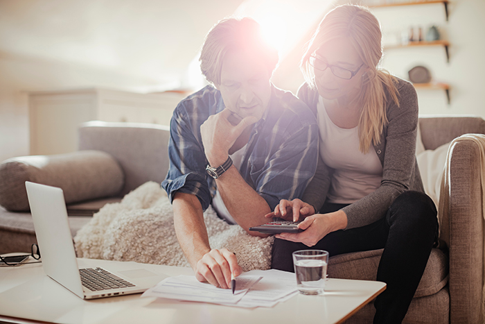 Couple calculating finances