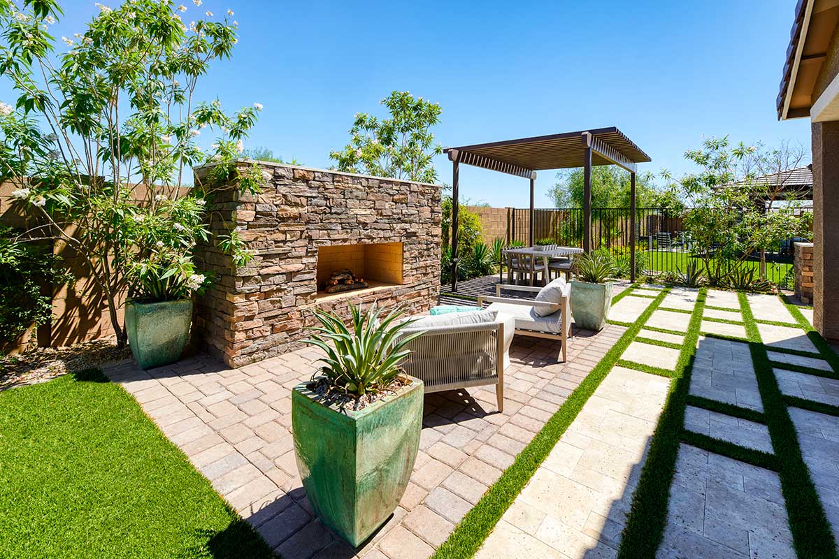 Beautiful patio with outdoor fireplace and seating