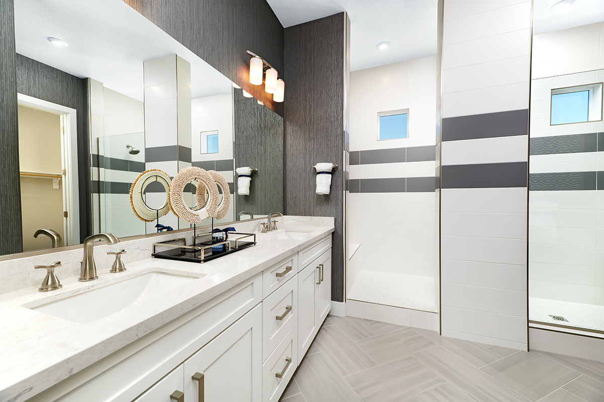 Tranquil primary bath with double sinks in the Delaney floor plan