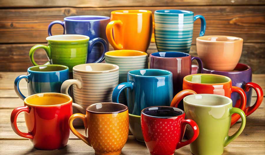 Arrangement of colorful coffee mugs that can be used as host gifts