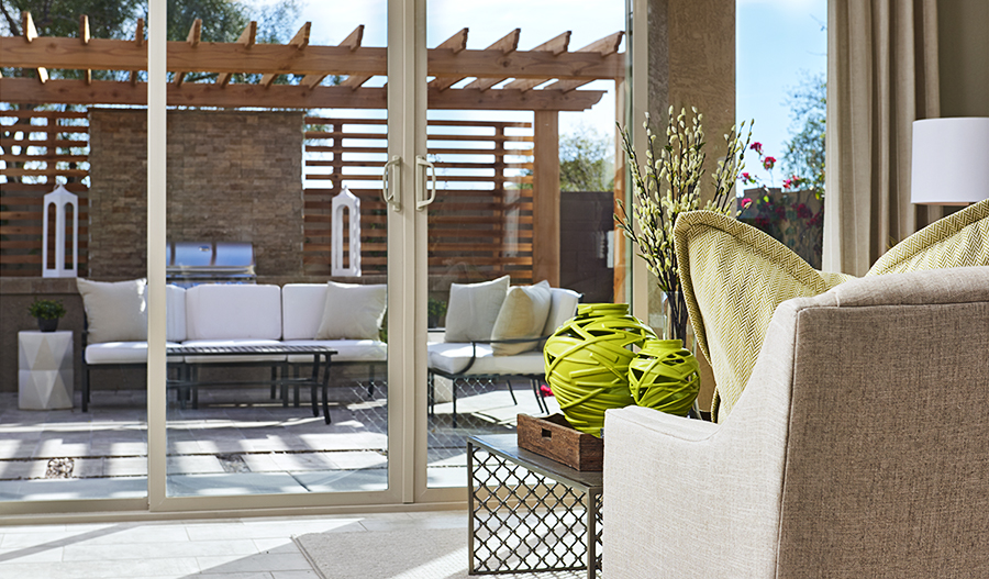 Family room and patio in the Peridot floor plan