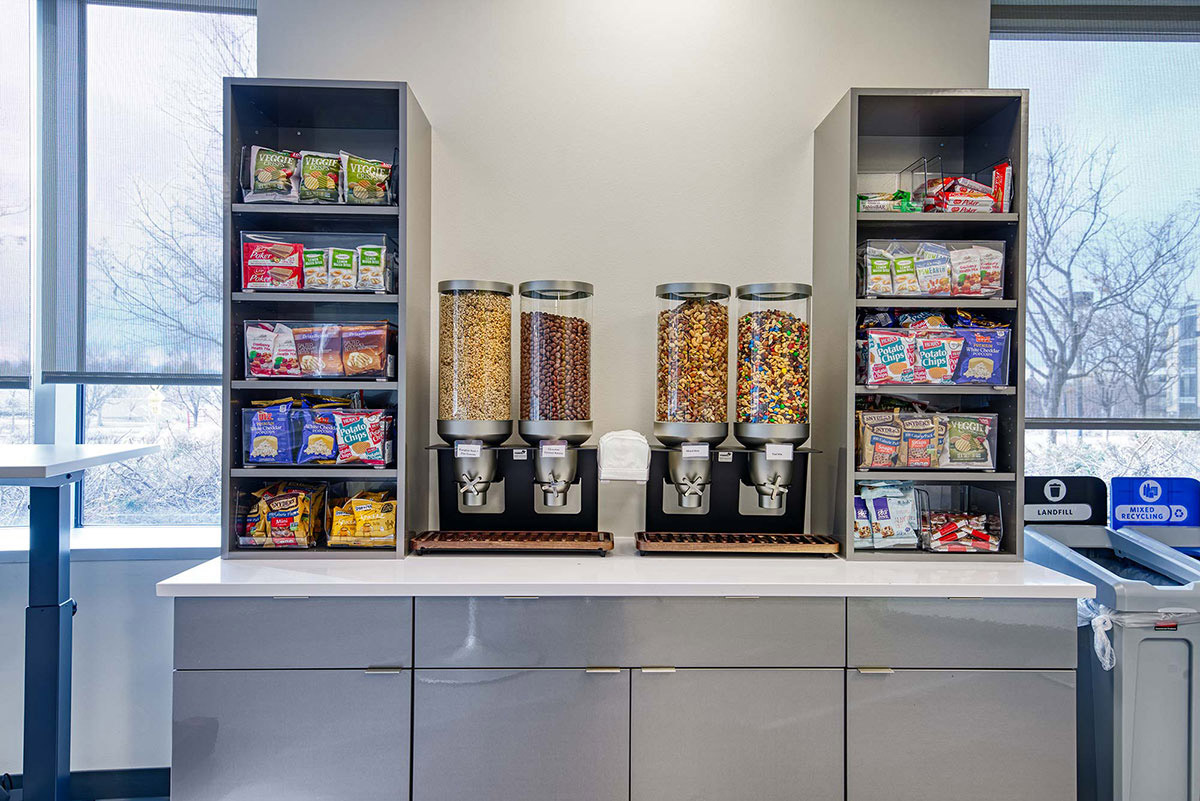 Employee lounge snack bar with nuts, pretzels, chips, fruit snacks, popcorn and many other snacks